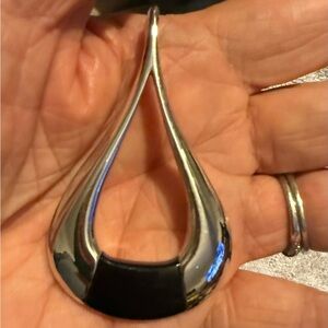 Ladies Macy’s beautiful silver and black pendant no chain it’s like new